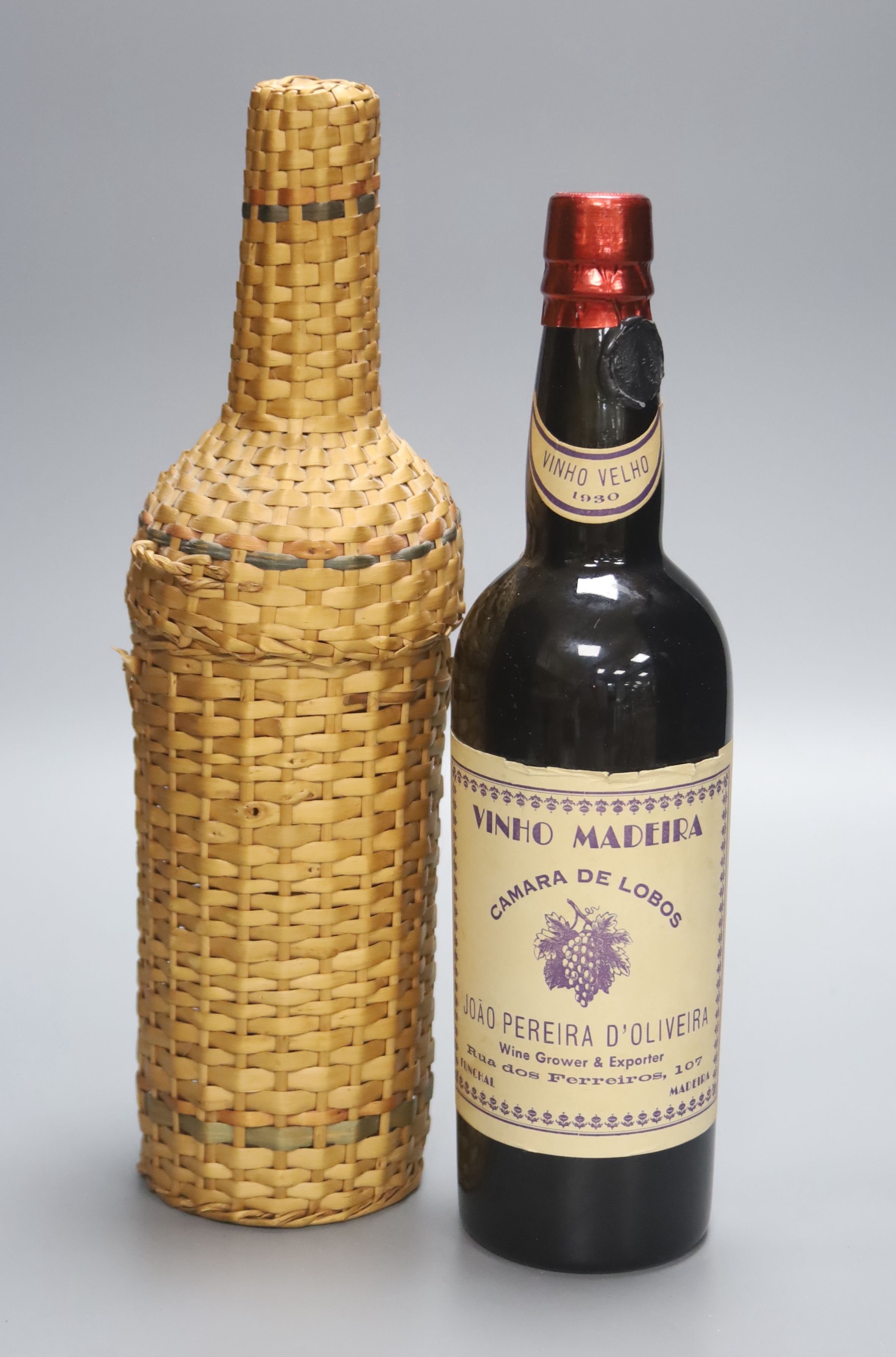 A bottle of Joao Pereira dOliveira Madeira 1930